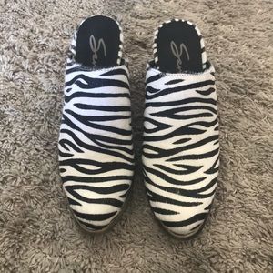 Zebra print heeled slip ons